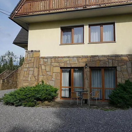 Quarto em Acomodações Particulares Szarotka Dzianisz